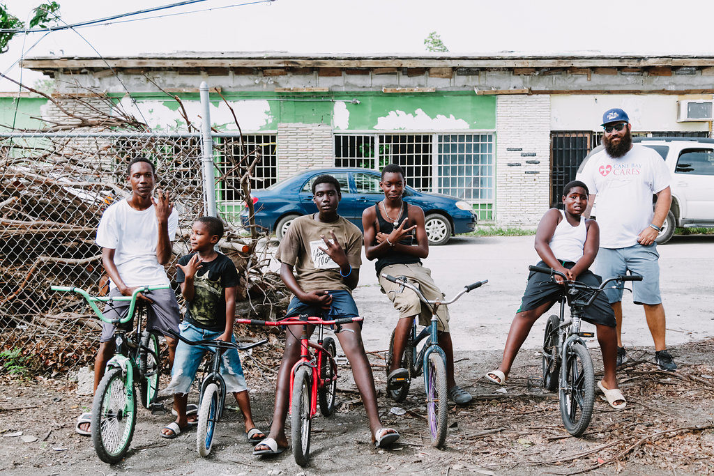 Cane Bay Cares distributes water at the Boys and Girls Club in Frederiksted in the aftermath of Hurricane Maria. Photo Credit: http://nicolecanegata.com/