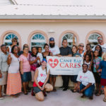 Cane Bay Partners volunteers distribute several thousand pounds of food, hundreds of LUCI solar lights and 6 pallets of water donated by St. Croix Foundation at Zion Christian Academy on Saturday, Nov. 11. Photo credit: Nicole Canegata http://nicolecanegata.com/