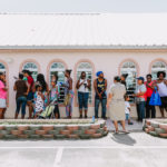 Cane Bay Partners volunteers distribute several thousand pounds of food, hundreds of LUCI solar lights and 6 pallets of water donated by St. Croix Foundation at Zion Christian Academy on Saturday, Nov. 11. Photo credit: Nicole Canegata http://nicolecanegata.com/