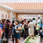 Cane Bay Partners volunteers distribute several thousand pounds of food, hundreds of LUCI solar lights and 6 pallets of water donated by St. Croix Foundation at Zion Christian Academy on Saturday, Nov. 11. Photo credit: Nicole Canegata http://nicolecanegata.com/