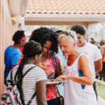 Cane Bay Partners volunteers distribute several thousand pounds of food, hundreds of LUCI solar lights and 6 pallets of water donated by St. Croix Foundation at Zion Christian Academy on Saturday, Nov. 11. Photo credit: Nicole Canegata http://nicolecanegata.com/