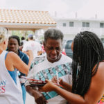 Cane Bay Partners volunteers distribute several thousand pounds of food, hundreds of LUCI solar lights and 6 pallets of water donated by St. Croix Foundation at Zion Christian Academy on Saturday, Nov. 11. Photo credit: Nicole Canegata http://nicolecanegata.com/