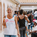 Cane Bay Partners volunteers distribute several thousand pounds of food, hundreds of LUCI solar lights and 6 pallets of water donated by St. Croix Foundation at Zion Christian Academy on Saturday, Nov. 11. Photo credit: Nicole Canegata http://nicolecanegata.com/
