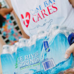 Cane Bay Partners volunteers distribute several thousand pounds of food, hundreds of LUCI solar lights and 6 pallets of water donated by St. Croix Foundation at Zion Christian Academy on Saturday, Nov. 11. Photo credit: Nicole Canegata http://nicolecanegata.com/