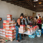 750 individuals and families received overflowing bags of food from Cane Bay Cares ahead of the Thanksgiving holiday Tuesday, Nov. 21 at Foundation Ministries. Photo credit: Nicole Canegata http://nicolecanegata.com/