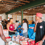 750 individuals and families received overflowing bags of food from Cane Bay Cares ahead of the Thanksgiving holiday Tuesday, Nov. 21 at Foundation Ministries. Photo credit: Nicole Canegata http://nicolecanegata.com/