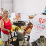 750 individuals and families received overflowing bags of food from Cane Bay Cares ahead of the Thanksgiving holiday Tuesday, Nov. 21 at Foundation Ministries. Photo credit: Nicole Canegata http://nicolecanegata.com/