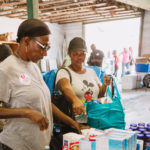 750 individuals and families received overflowing bags of food from Cane Bay Cares ahead of the Thanksgiving holiday Tuesday, Nov. 21 at Foundation Ministries. Photo credit: Nicole Canegata http://nicolecanegata.com/