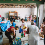 750 individuals and families received overflowing bags of food from Cane Bay Cares ahead of the Thanksgiving holiday Tuesday, Nov. 21 at Foundation Ministries. Photo credit: Nicole Canegata http://nicolecanegata.com/