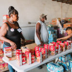 750 individuals and families received overflowing bags of food from Cane Bay Cares ahead of the Thanksgiving holiday Tuesday, Nov. 21 at Foundation Ministries. Photo credit: Nicole Canegata http://nicolecanegata.com/