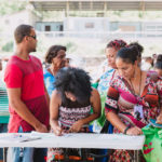 750 individuals and families received overflowing bags of food from Cane Bay Cares ahead of the Thanksgiving holiday Tuesday, Nov. 21 at Foundation Ministries. Photo credit: Nicole Canegata http://nicolecanegata.com/