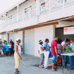 750 individuals and families received overflowing bags of food from Cane Bay Cares ahead of the Thanksgiving holiday Tuesday, Nov. 21 at Foundation Ministries. Photo credit: Nicole Canegata http://nicolecanegata.com/