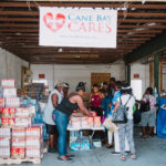 750 individuals and families received overflowing bags of food from Cane Bay Cares ahead of the Thanksgiving holiday Tuesday, Nov. 21 at Foundation Ministries. Photo credit: Nicole Canegata http://nicolecanegata.com/