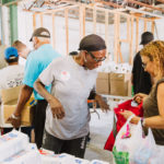 750 individuals and families received overflowing bags of food from Cane Bay Cares ahead of the Thanksgiving holiday Tuesday, Nov. 21 at Foundation Ministries. Photo credit: Nicole Canegata http://nicolecanegata.com/