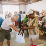 750 individuals and families received overflowing bags of food from Cane Bay Cares ahead of the Thanksgiving holiday Tuesday, Nov. 21 at Foundation Ministries. Photo credit: Nicole Canegata http://nicolecanegata.com/