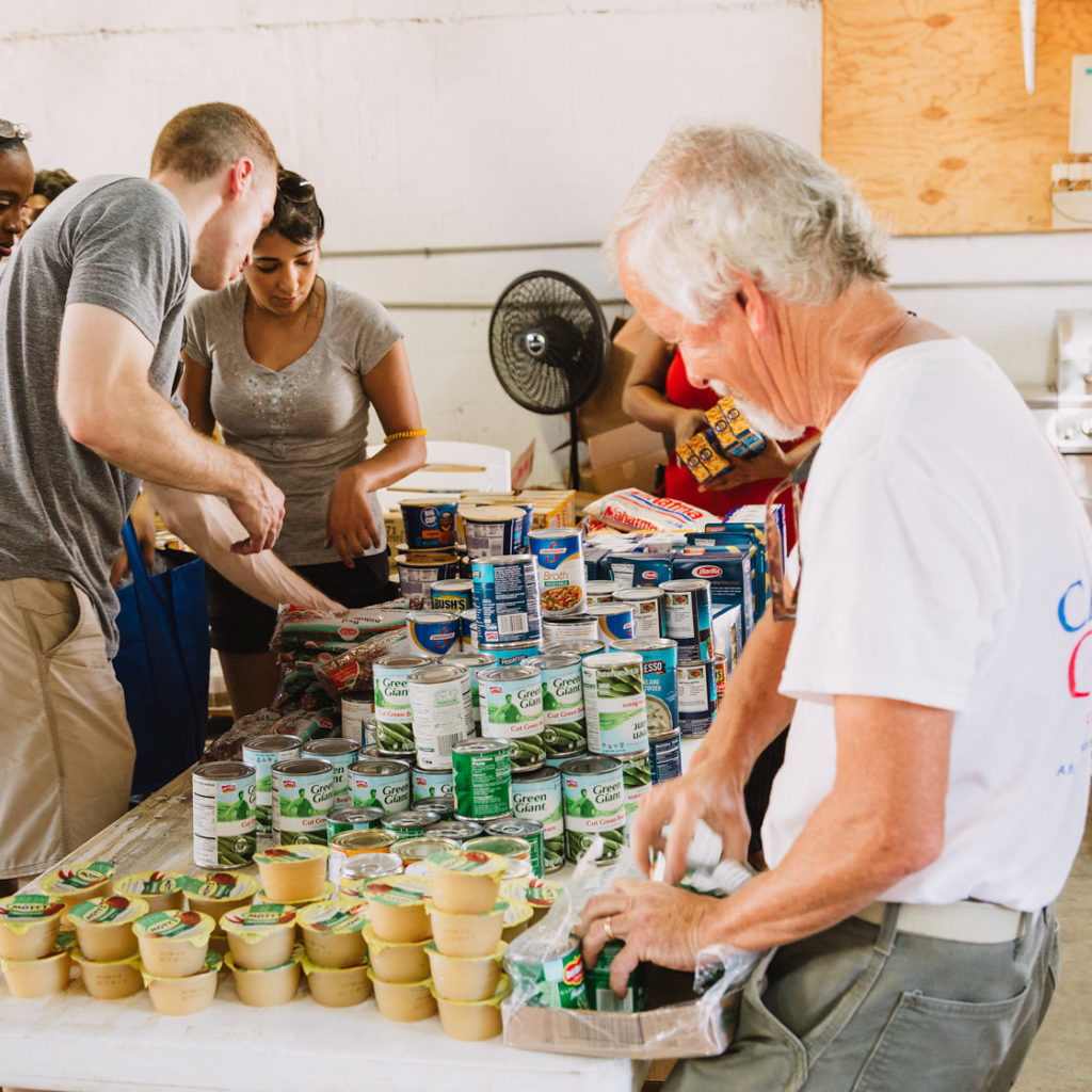 750 individuals and families received overflowing bags of food from Cane Bay Cares ahead of the Thanksgiving holiday Tuesday, Nov. 21 at Foundation Ministries. Photo credit: Nicole Canegata http://nicolecanegata.com/