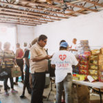 750 individuals and families received overflowing bags of food from Cane Bay Cares ahead of the Thanksgiving holiday Tuesday, Nov. 21 at Foundation Ministries. Photo credit: Nicole Canegata http://nicolecanegata.com/