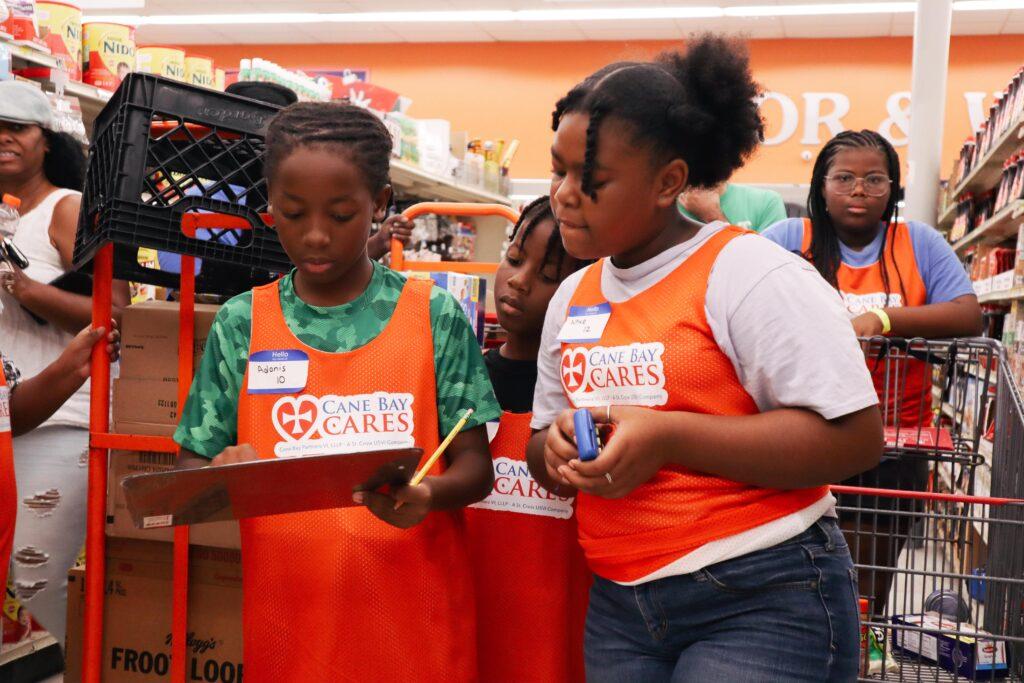 Sweep participants Adonis Moorehead (left), Nial Moorehead (center), Nhye Griffin (right) and Cherish Abraham (back)