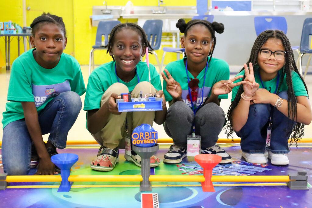 Students participate in Operation Inspire's 2025 Robotics Summer Program at Claude O. Markoe Elementary School.
